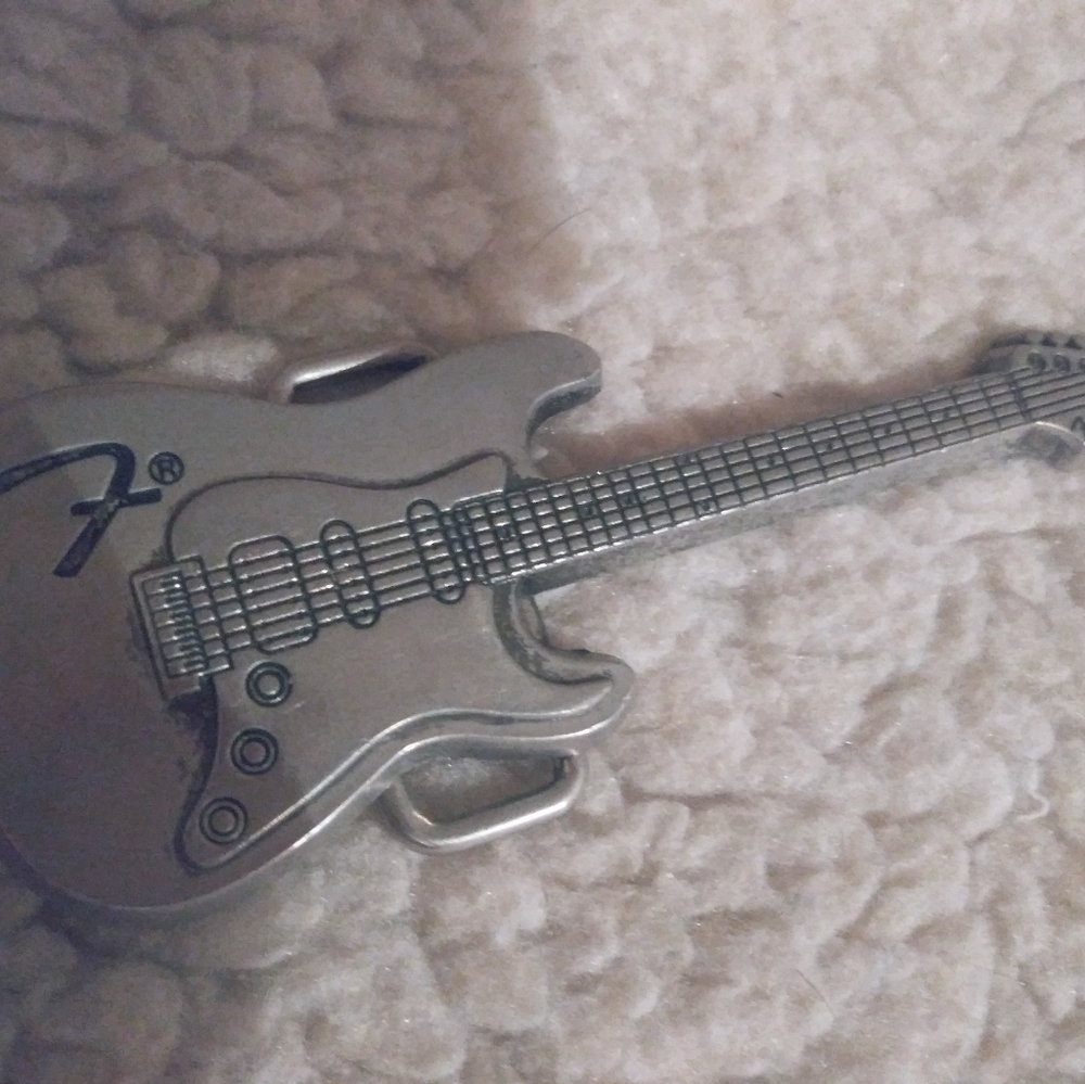 VINTAGE FENDER STRATOCASTER BELT BUCKLE IN GREAT CONDITION.